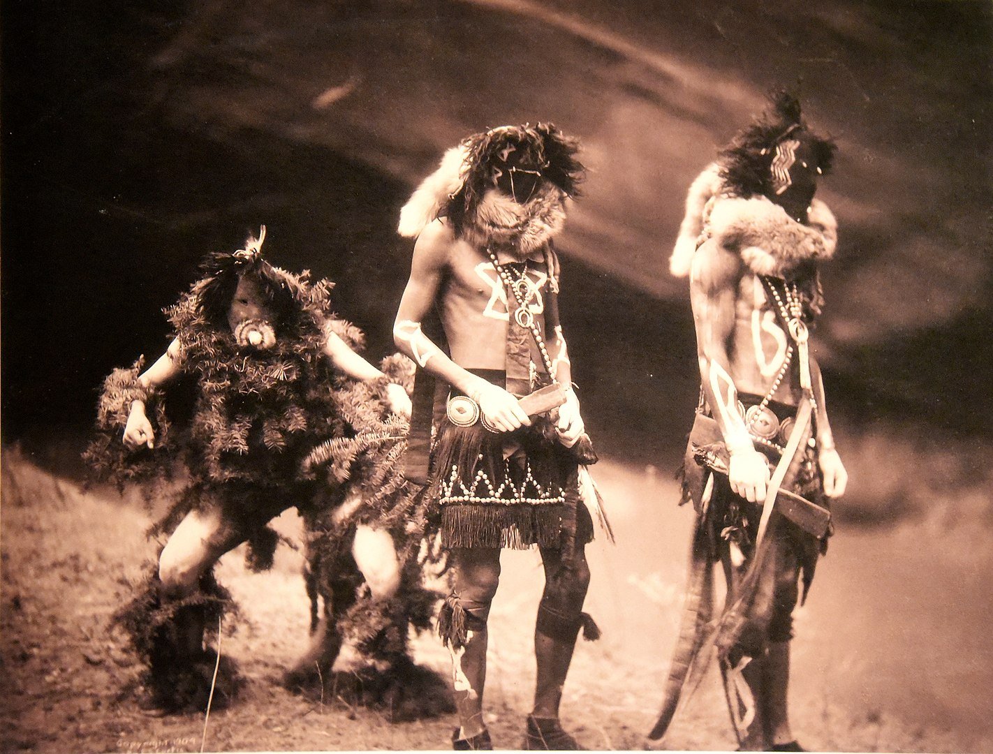 1422px-Navajo_Yebichai_(Yei_Bi_Chei)_dancers._Edward_S._Curtis._USA,_1900._The_Wellcome_Collection,_London